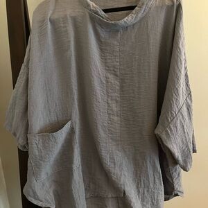 Cut loose grey tunic. Never worn it is one size fits all
